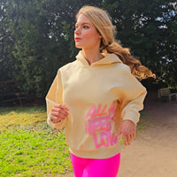 “All We Need Is Love” Oversized Hoodie – Beige with Pink Print